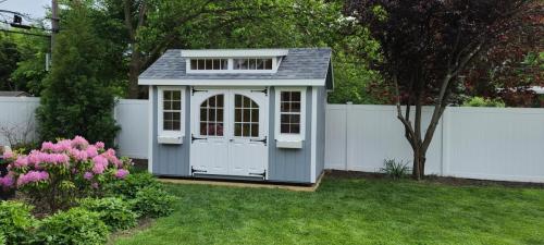 8-X-12-wood-garden-with-arched-9-lite-doors-and-transom-dormer