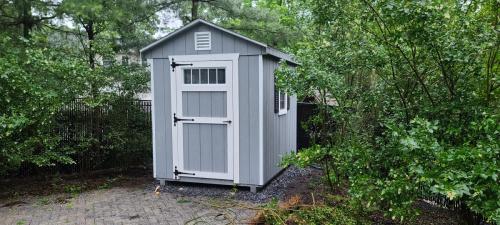 East-Setauket-6x8-a-frame-stonehedge-slatestone-black-louvered-shutters-transom-doors-3