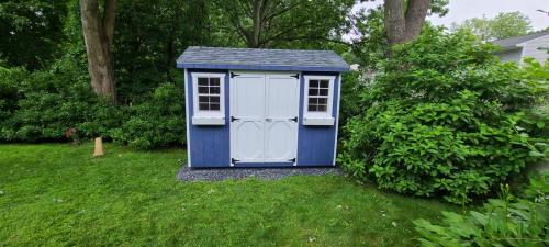 Huntington-Station-6x10-a-frame-cc-navy-slatestone-grey-white-doors-white-flowerboxes-2