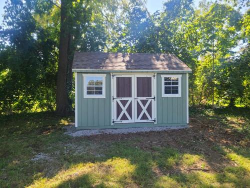 LISB-Glen-Cove-10-x-14-Cape-sagebrush-green-navajo-trim-padre-brown-doors-teak